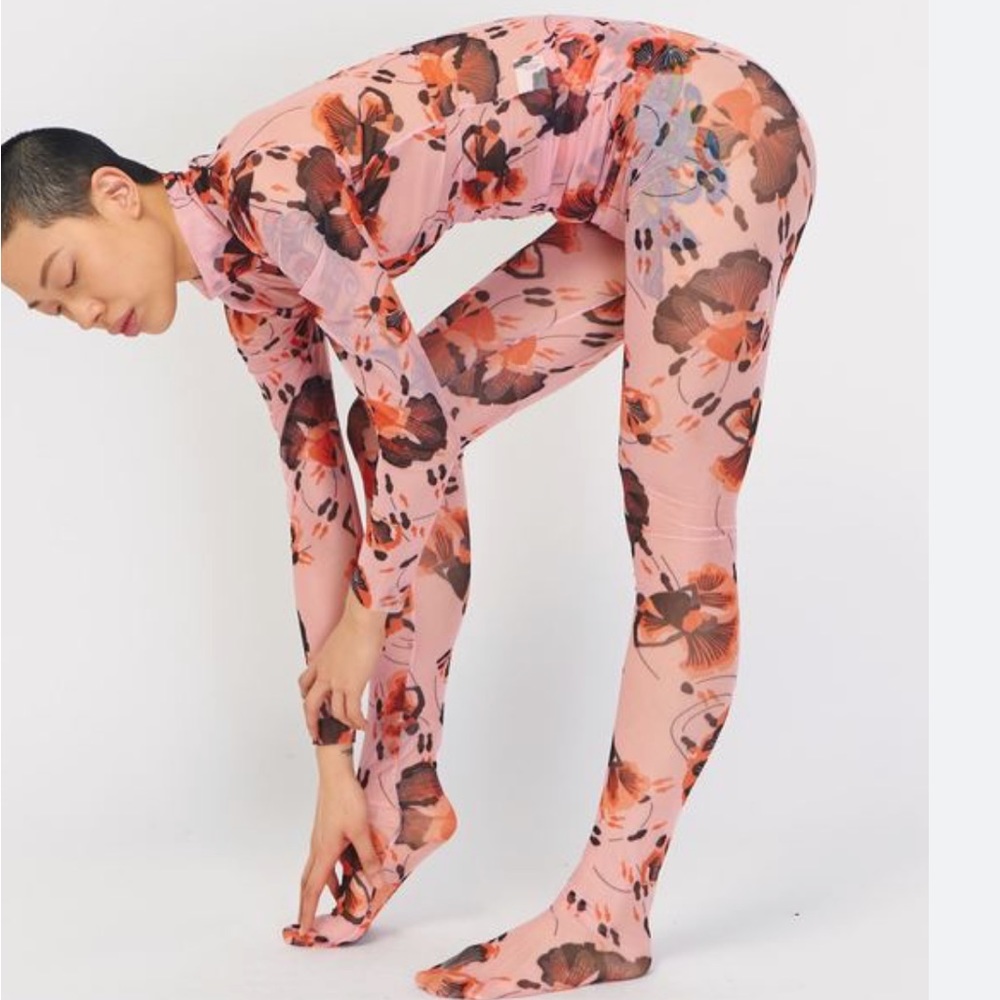 Sheer top and leggings, not a lot of stretch top is a large, bottom is a med